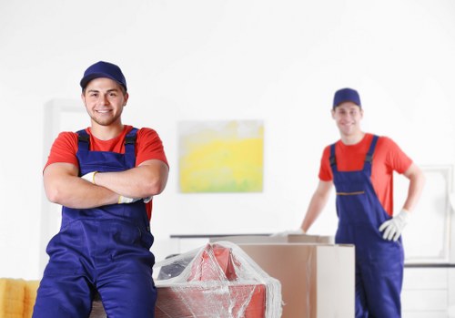 Office removal planning in South Harrow with packed boxes and workspace furniture