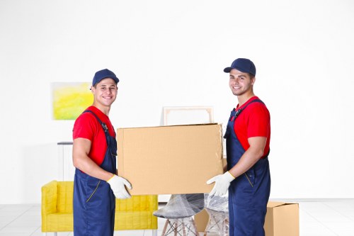 Local man with a van loading furniture for a move in South Harrow