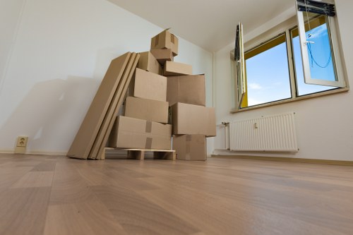 Furniture and box loading into a moving van in South Harrow