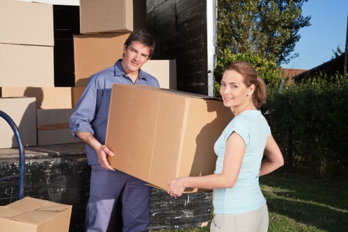 Packed office furniture and equipment ready for a business move